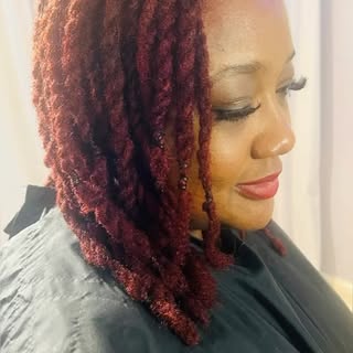 Elevate your style with custom colored locs. Book now and let your hair speak Fabulous. #colorlocs #