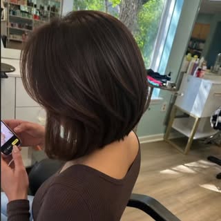 A beautifully stacked brunette bob with just the right amount of angle for movement, body, and shine