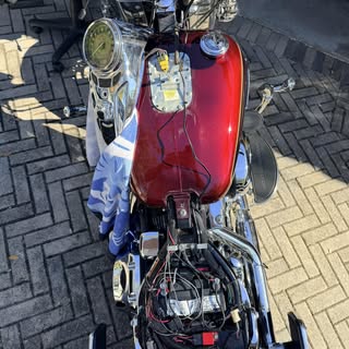 Installing a cell phone charger and new seat… Harley-Davidson
