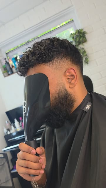 Back with a curly bang

Hair systems doing what Hair systems do 🤝🏾
