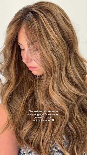 One year into growing her hair back after losing it to cancer, she was ready for a transformation th