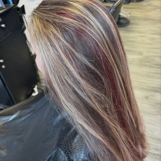 Blonde highlights to blend with the greys and some cool pops of red with a big chop! This girly live