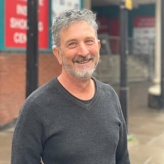 The smile of a man who trusts his look - coming back time and time again to Claark Barbers for that 