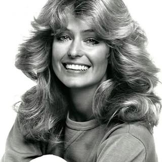 WEDNESDAY IS HAIRSTYLE DAY
Which hairstyle would achieve a look closest to a lion’s mane…Maybe… Feat