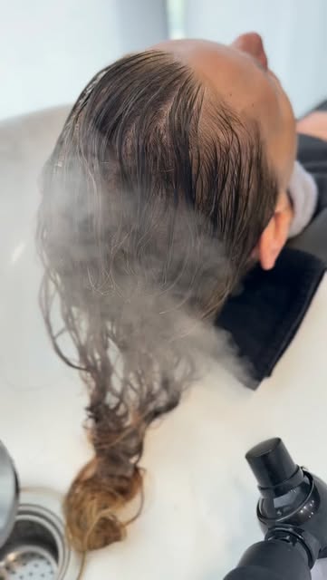 The steam might look like it’s just the relaxing part of the scalp treatment, but there’s purpose.

