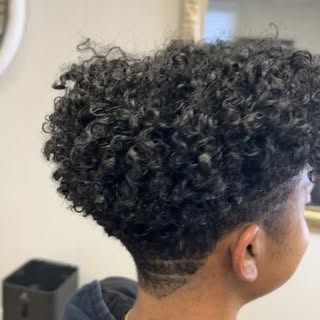 She walked in with hair past her shoulders, and there was absolutely nothing wrong with it. She was 