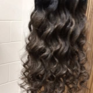 This woman’s 20” long length hair system was custom designed to add length and volume to clients exi