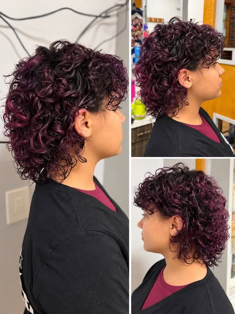 When your client is just as cool as the hair 🖤💜
Gave this sweet girl a curly wolf cut with a muted