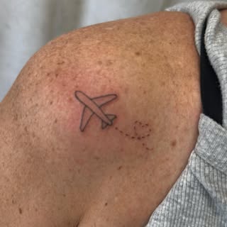 Meaningful airplane tattoo done by @smp_trinity 

Book your tiny tattoo today by texting the office 