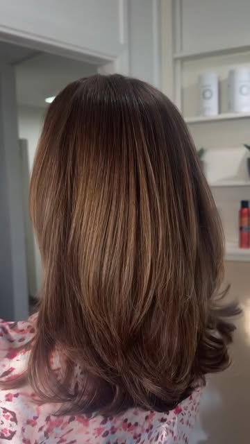 Layers and a bouncy blowout… name a better duo!

-

Book your haircut appointment today with Sasha a