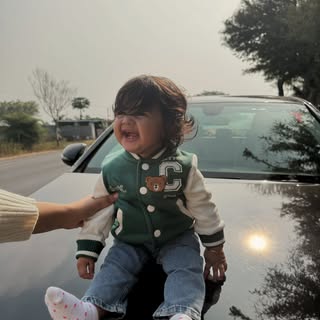 In your tiny hands, you hold my whole heart, my sweet 7-month-old miracle ,Seven months of you, and 