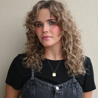 Curly hair is never one size fits all. Jade loves creating customized cuts that enhance natural text