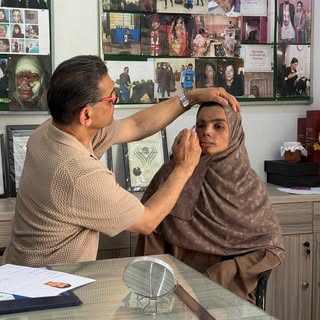 These images capture Dr. Shahmalak during pre-op consultations ahead of eyebrow transplants for six 