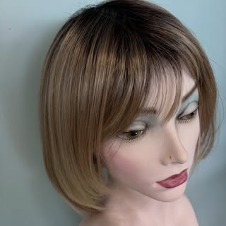 How lovely is this wig, Human hair, root shadow and a silk top which means it uses a layer of silk f