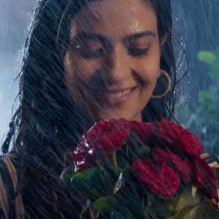“Some love stories don’t need perfect weather… they bloom in the rain. 🌧️❤️
Every raindrop brought 