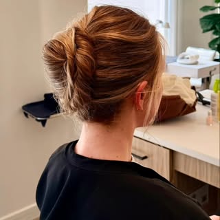 Effortless elegance 
A soft, modern updo with a polished finish. Simple, timeless, and perfect for a