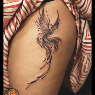 Rising from the ashes, stronger than before. A phoenix carved in ink — fierce, fluid, and made to tr