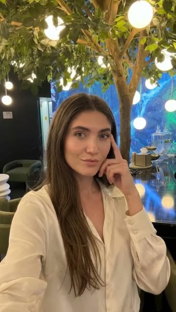 A quiet moment between consultations at the clinic—healthy, fuller hair always starts with understan