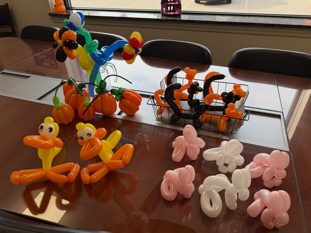 Our dear friend Tim Crosson stopped back in to deliver surprise balloon art gifts for our wig recipi