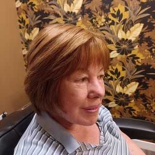 A glimpse of a styled human hair lace front wig on a customer, priced at $1575. Beautiful outcome!

