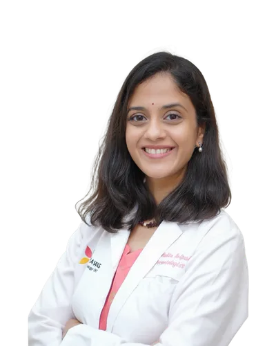 Dr. Mukta Tulpule